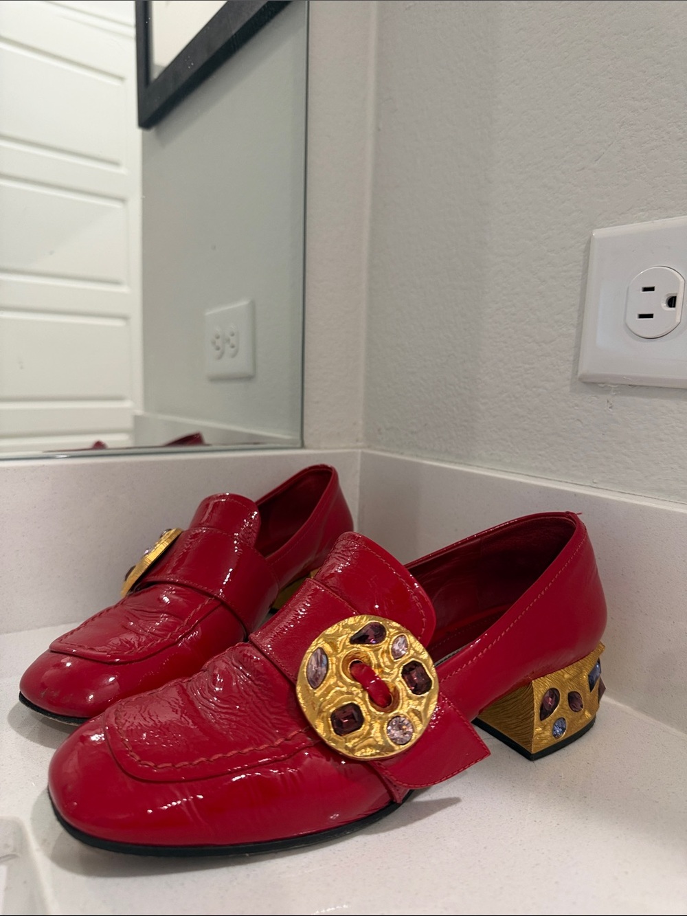 Prada Red Patent Leather Loafers with Gold Medallion